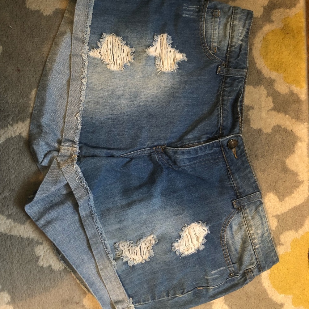 Distressed denim shorts